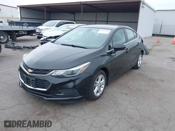 2018 Chevrolet Cruze LT with VIN 1G1BE5SM1J7145833, listed as a IAAI auction lot 43438280 with 138,830 mi miles and . Bid and sale history available at DreamBid. Image 18.