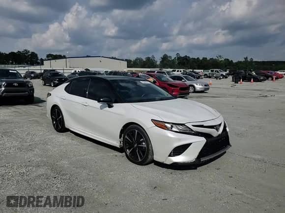 2018 Toyota Camry XSE с VIN 4T1B61HK0JU027305, выставлен на аукционе Copart как лот 69680395 с пробегом 73 371 миль миль и Списание • Salvage title. История ставок и продаж доступна на DreamBid. Изображение 13.