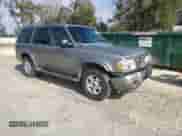 2000 Ford Explorer Limited with VIN 1FMDU75E9YUB50157, listed as a Copart auction lot 88743875 with 184,376 mi miles and Salvage title. Bid and sale history available at DreamBid. Image 4.