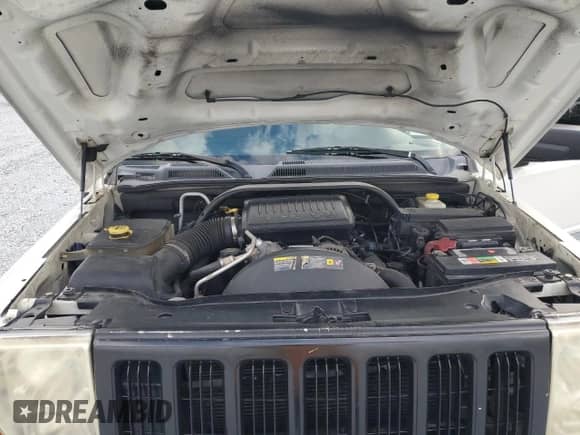 2006 Jeep Commander Limited z VIN 1J8HH58N76C247976, wystawiony jako Copart lot #88149615 z przebiegiem 155 922 mil mil oraz Szkoda całkowita • Salvage title. Historia ofert i sprzedaży dostępna na DreamBid. Obrazek 12.