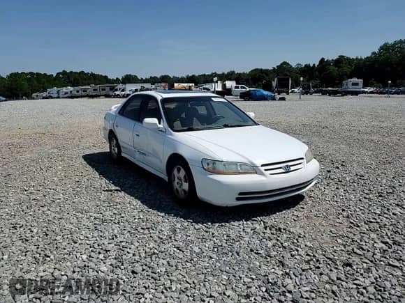 2001 Honda Accord EX z VIN 1HGCG16561A061805, wystawiony jako Copart lot #70577215 z przebiegiem 233 090 mil mil oraz Szkoda całkowita • Salvage title. Historia ofert i sprzedaży dostępna na DreamBid. Obrazek 13.