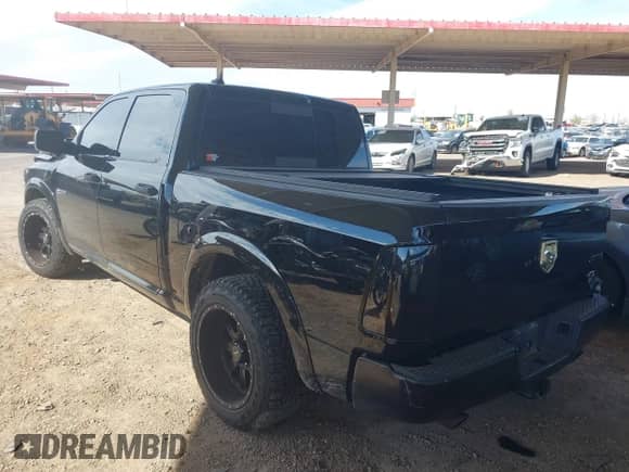 2014 Ram 1500 Big Horn z VIN 1C6RR7LT7ES293023, wystawiony jako IAAI lot #37555786 z przebiegiem 134 905 mil mil oraz . Historia ofert i sprzedaży dostępna na DreamBid. Obrazek 3.