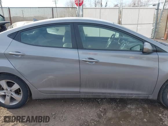 2012 Hyundai Elantra GLS z VIN KMHDH4AE4CU389410, wystawiony jako IAAI lot #41430103 z przebiegiem 42 173 mil mil oraz . Historia ofert i sprzedaży dostępna na DreamBid. Obrazek 13.