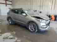 2017 Hyundai Santa Fe 2.4L z VIN 5NMZUDLB0HH012693, wystawiony jako Copart lot #85827455 z przebiegiem 139 188 mil mil oraz Szkoda całkowita • Salvage title. Historia ofert i sprzedaży dostępna na DreamBid. Obrazek 4.