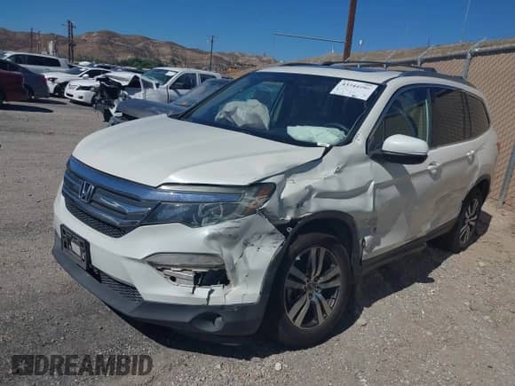 2016 Honda Pilot EX-L z VIN 5FNYF6H7XGB043603, wystawiony jako IAAI lot #43344995 z przebiegiem 211 226 mil mil oraz . Historia ofert i sprzedaży dostępna na DreamBid. Obrazek 17.