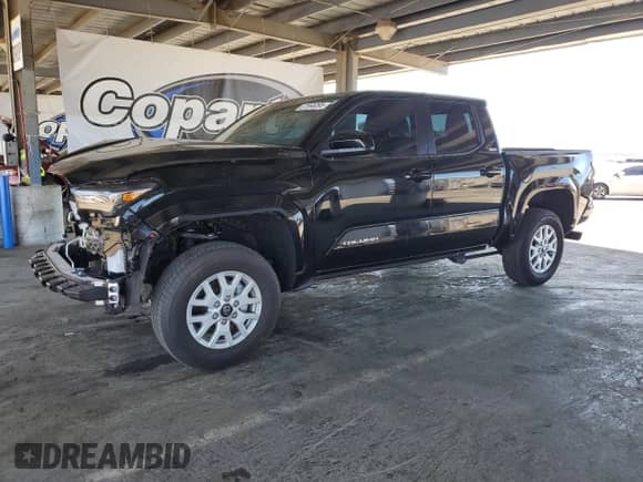 2024 Toyota Tacoma SR5 with VIN 3TMKB5FN9RM023449, listed as a Copart auction lot 67866095 with 5,550 mi miles and Salvage title. Bid and sale history available at DreamBid. Image 1.