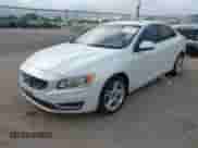 2015 Volvo S60 T5 Drive-E Premier with VIN YV126MFB8F1305105, listed as a IAAI auction lot 42566641 with 115,535 mi miles and . Bid and sale history available at DreamBid. Image 2.