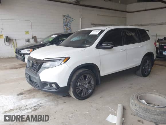 2019 Honda Passport EX-L with VIN 5FNYF8H51KB028703, listed as a IAAI auction lot 42162823 with 74,547 mi miles and . Bid and sale history available at DreamBid. Image 2.