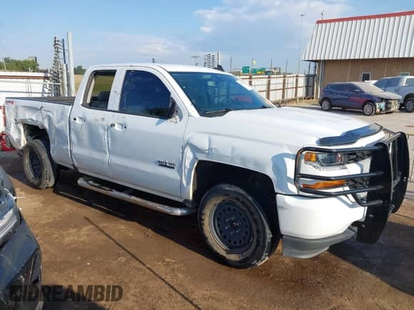 2019 Chevrolet Silverado 1500 Custom z VIN 2GCVKMEC7K1243970, wystawiony jako IAAI lot #43347102 z przebiegiem 79 556 mil mil oraz . Historia ofert i sprzedaży dostępna na DreamBid. Obrazek 13.