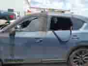 2023 Mazda CX-5 S Preferred z VIN JM3KFBCM2P0233638, wystawiony jako IAAI lot #42915682 z przebiegiem 62 982 mil mil oraz . Historia ofert i sprzedaży dostępna na DreamBid. Obrazek 13.