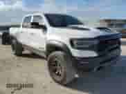 2022 Ram 1500 TRX с VIN 1C6SRFU91NN252416, выставлен на аукционе Copart как лот 85870095 с пробегом 64 500 миль миль и Списание • Salvage title. История ставок и продаж доступна на DreamBid. Изображение 4.