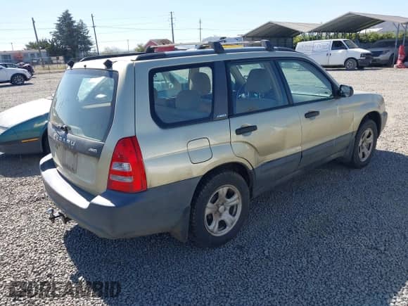 2003 Subaru Forester X with VIN JF1SG63603H712897, listed as a IAAI auction lot 42910575 with 221,961 mi miles and . Bid and sale history available at DreamBid. Image 4.