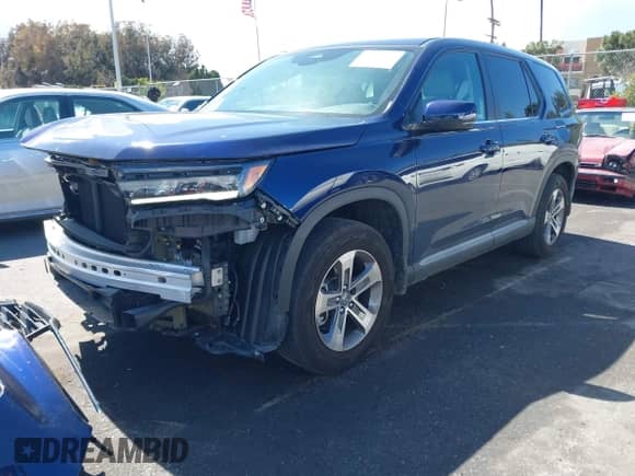 2024 Honda Pilot EX-L with VIN 5FNYG2H57RB004488, listed as a IAAI auction lot 41796097 with 18,479 mi miles and . Bid and sale history available at DreamBid. Image 2.