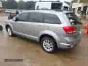 2015 Dodge Journey SXT z VIN 3C4PDCBG3FT628063, wystawiony jako IAAI lot #43216943 z przebiegiem 141 916 mil mil oraz . Historia ofert i sprzedaży dostępna na DreamBid. Obrazek 3.