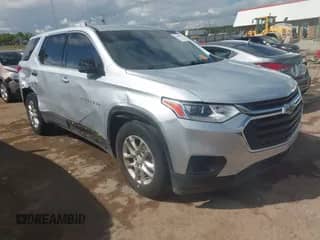 2019 Chevrolet Traverse LS z VIN 1GNERFKW7KJ186981, wystawiony jako IAAI lot #43303144 z przebiegiem 130 898 mil mil oraz . Historia ofert i sprzedaży dostępna na DreamBid. Obrazek 1.