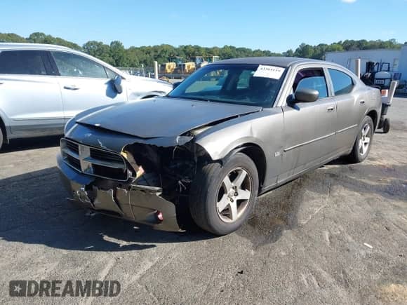 2010 Dodge Charger SXT with VIN 2B3CA3CV8AH217037, listed as a IAAI auction lot 43364119 with 239,874 mi miles and . Bid and sale history available at DreamBid. Image 2.