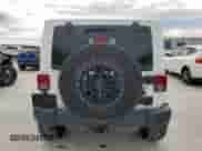 2013 Jeep Wrangler Rubicon 10th Anniversary with VIN 1C4BJWCGXDL550313, listed as a Copart auction lot 60374715 with 122,936 mi miles and Clean title. Bid and sale history available at DreamBid. Image 6.