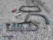 2001 Chevrolet Suburban LS z VIN 1GNFK16T51J287060, wystawiony jako Copart lot #71488505 z przebiegiem 145 575 mil mil oraz Nie do naprawy • Non repairable. Historia ofert i sprzedaży dostępna na DreamBid. Obrazek 13.