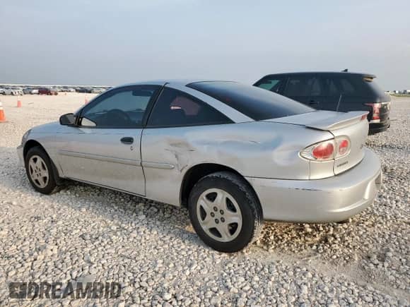 2000 Chevrolet Cavalier with VIN 1G1JC1243Y7363101, listed as a Copart auction lot 57591485 with 252,742 mi miles and Salvage title. Bid and sale history available at DreamBid. Image 2.