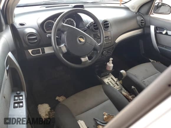 2010 Chevrolet Aveo 1LT с VIN KL1TD6DE0AB101529, выставлен на аукционе Copart как лот 66350614 с пробегом Не указан миль и Списание • Salvage title. История ставок и продаж доступна на DreamBid. Изображение 8.