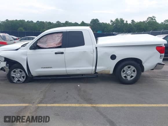 2012 Toyota Tundra z VIN 5TFRU5F17CX027958, wystawiony jako IAAI lot #42690061 z przebiegiem 228 438 mil mil oraz . Historia ofert i sprzedaży dostępna na DreamBid. Obrazek 14.