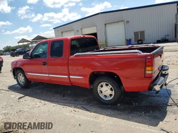 1999 GMC Sierra 1500 SLE with VIN 2GTEC19T8X1517366, listed as a Copart auction lot 63224435 with 519,318 mi miles and Salvage title. Bid and sale history available at DreamBid. Image 2.