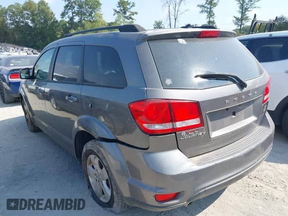 2012 Dodge Journey SXT z VIN 3C4PDCBG8CT220461, wystawiony jako IAAI lot #43284185 z przebiegiem 265 254 mil mil oraz . Historia ofert i sprzedaży dostępna na DreamBid. Obrazek 3.