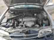 1996 Honda Accord LX z VIN 1HGCD5638TA093463, wystawiony jako Copart lot #60174595 z przebiegiem 154 571 mil mil oraz Czysty tytuł • Clean title. Historia ofert i sprzedaży dostępna na DreamBid. Obrazek 11.