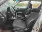 2011 Subaru Forester X z VIN JF2SHBBC9BG723345, wystawiony jako Copart lot #81730085 z przebiegiem 173 477 mil mil oraz Szkoda całkowita • Salvage title. Historia ofert i sprzedaży dostępna na DreamBid. Obrazek 7.