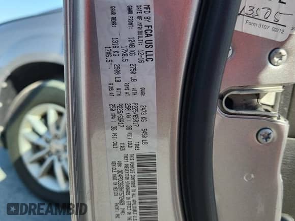 2017 Dodge Journey SXT with VIN 3C4PDCBG9HT572469, listed as a Copart auction lot 81464005 with 77,095 mi miles and Salvage title. Bid and sale history available at DreamBid. Image 13.