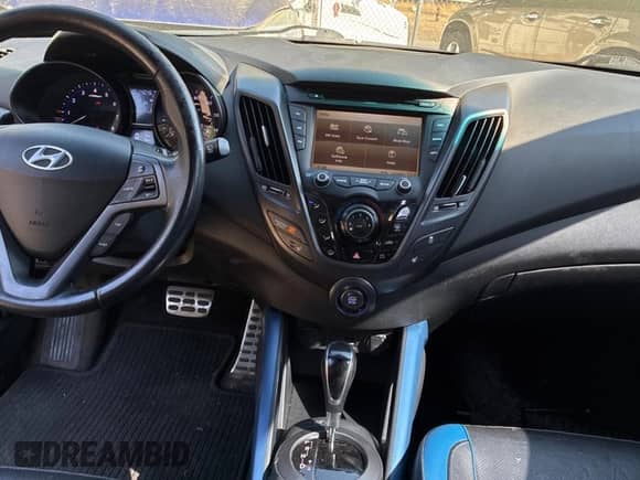 2013 Hyundai Veloster Turbo с VIN KMHTC6AE3DU097576, выставлен на аукционе Copart как лот 82102005 с пробегом 140 467 миль миль и Чистый • Clean title. История ставок и продаж доступна на DreamBid. Изображение 9.