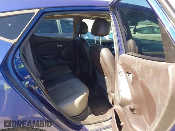 2012 Hyundai Tucson GLS with VIN KM8JU3AC9CU530253, listed as a IAAI auction lot 41677093 with 203,025 mi miles and . Bid and sale history available at DreamBid. Image 8.