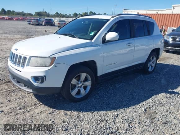 2015 Jeep Compass High Altitude with VIN 1C4NJCEA8FD210935, listed as a IAAI auction lot 43526780 with 195,054 mi miles and . Bid and sale history available at DreamBid. Image 2.