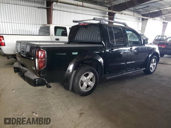 2005 Nissan Frontier SE with VIN 1N6AD07UX5C421602, listed as a Copart auction lot 80371105 with 126,032 mi miles and Salvage title. Bid and sale history available at DreamBid. Image 3.