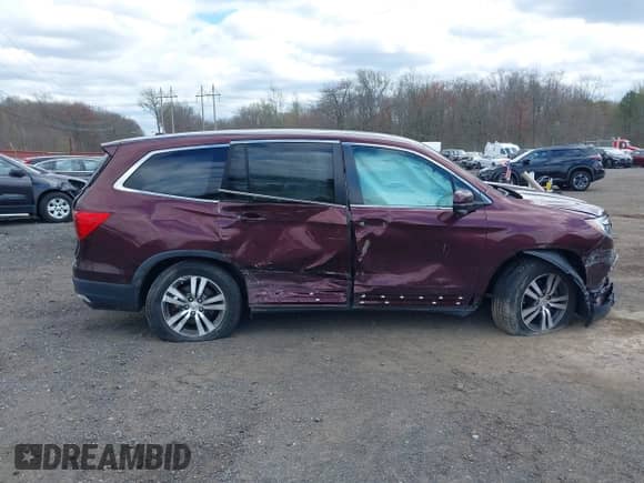 2017 Honda Pilot EX-L with VIN 5FNYF6H74HB040889, listed as a IAAI auction lot 42040094 with 84,001 mi miles and . Bid and sale history available at DreamBid. Image 13.