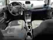 2014 Ford Fiesta S z VIN 3FADP4AJ9EM125472, wystawiony jako Copart lot #54683635 z przebiegiem 72 884 mil mil oraz Nie do naprawy • Non repairable. Historia ofert i sprzedaży dostępna na DreamBid. Obrazek 8.