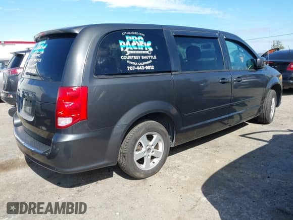 2012 Dodge Grand Caravan SE with VIN 2C4RDGBG1CR389286, listed as a IAAI auction lot 42952196 with 126,267 mi miles and . Bid and sale history available at DreamBid. Image 4.
