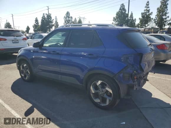 2021 Hyundai Venue Denim with VIN KMHRC8A3XMU120288, listed as a Copart auction lot 82322955 with 86,055 mi miles and Salvage title. Bid and sale history available at DreamBid. Image 2.