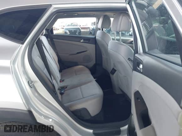 2018 Hyundai Tucson Value with VIN KM8J33A21JU817240, listed as a IAAI auction lot 43257404 with 81,892 mi miles and . Bid and sale history available at DreamBid. Image 8.