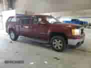 2009 GMC Sierra 1500 SLT with VIN 3GTEK33M79G226285, listed as a Copart auction lot 61543255 with 140,788 mi miles and Salvage title. Bid and sale history available at DreamBid. Image 4.