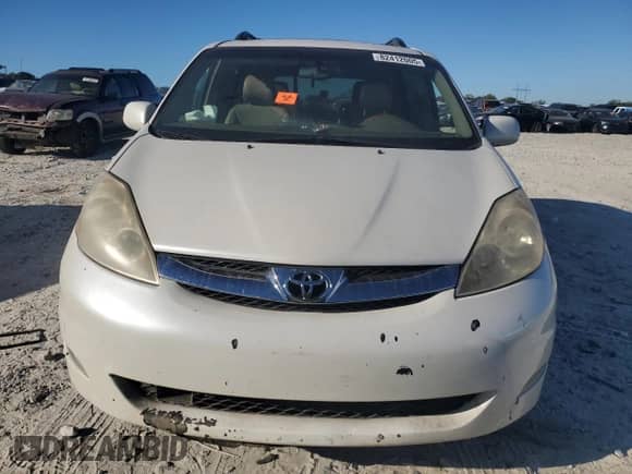 2006 Toyota Sienna XLE Limited z VIN 5TDZA22C16S411890, wystawiony jako Copart lot #82412005 z przebiegiem 187 414 mil mil oraz Szkoda całkowita • Salvage title. Historia ofert i sprzedaży dostępna na DreamBid. Obrazek 5.