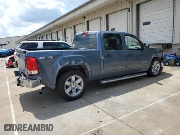 2013 GMC Sierra 1500 SLE z VIN 3GTP2VE74DG148682, wystawiony jako Copart lot #63600895 z przebiegiem 106 756 mil mil oraz Szkoda całkowita • Salvage title. Historia ofert i sprzedaży dostępna na DreamBid. Obrazek 3.