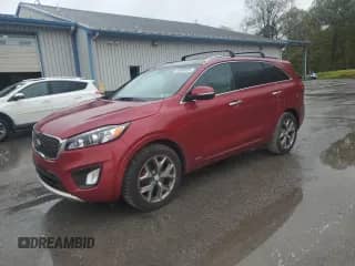 2016 Kia Sorento SXL z VIN 5XYPKDA54GG105140, wystawiony jako Copart lot #85860835 z przebiegiem 135 740 mil mil oraz Szkoda całkowita • Salvage title. Historia ofert i sprzedaży dostępna na DreamBid. Obrazek 1.