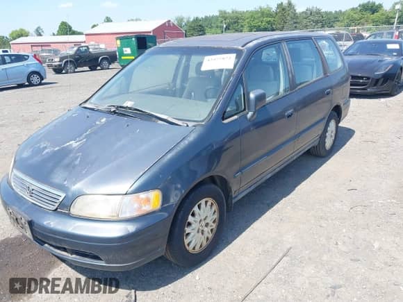 1997 Honda Odyssey EX with VIN JHMRA1879VC014933, listed as a IAAI auction lot 42577872 with 235,083 mi miles and . Bid and sale history available at DreamBid. Image 2.