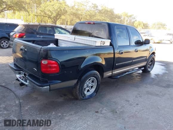 2003 Ford F-150 XLT z VIN 1FTRW07613KB48604, wystawiony jako IAAI lot #43381665 z przebiegiem Nie podano mil oraz . Historia ofert i sprzedaży dostępna na DreamBid. Obrazek 4.