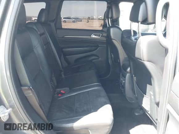 2017 Jeep Grand Cherokee 75th Anniversary z VIN 1C4RJEAG2HC829272, wystawiony jako IAAI lot #41908383 z przebiegiem 82 323 mil mil oraz . Historia ofert i sprzedaży dostępna na DreamBid. Obrazek 8.