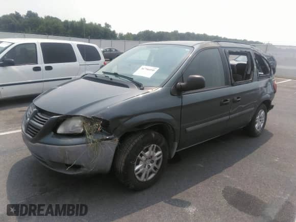 2007 Dodge Caravan SE with VIN 1D4GP25R37B111124, listed as a IAAI auction lot 36796050 with 152,038 mi miles and . Bid and sale history available at DreamBid. Image 2.