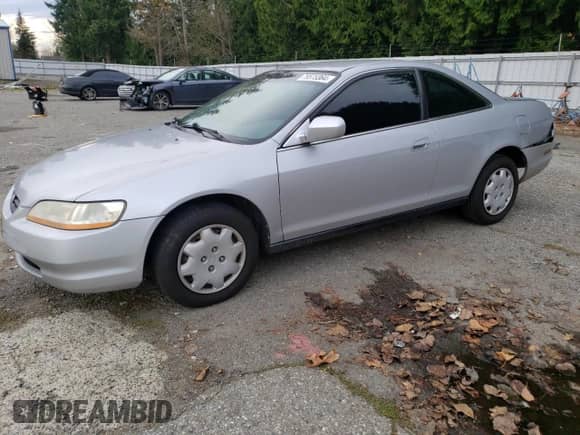 2000 Honda Accord LX с VIN 1HGCG3243YA022818, выставлен на аукционе Copart как лот 79575364 с пробегом 182 005 миль миль и Списание • Salvage title. История ставок и продаж доступна на DreamBid. Изображение 1.