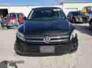 2014 Volkswagen Tiguan с VIN WVGCV3AXXEW604117, выставлен на аукционе Copart как лот 78791874 с пробегом 194 837 миль миль и Списание • Salvage title. История ставок и продаж доступна на DreamBid. Изображение 5.