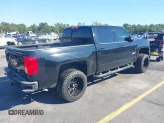 2018 Chevrolet Silverado 1500 LTZ z VIN 3GCUKSEC6JG364379, wystawiony jako IAAI lot #43445037 z przebiegiem 140 652 mil mil oraz . Historia ofert i sprzedaży dostępna na DreamBid. Obrazek 4.